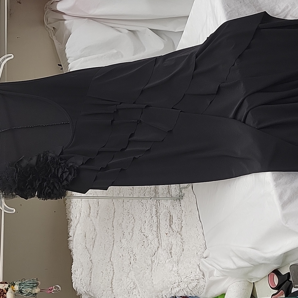 Adorable polyester dress with ruffles to the hip